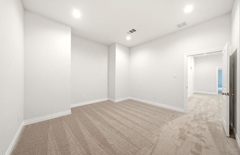 Spacious, unfurnished interior of a new home in The Woodlands Hills 65′, Willis (Image 41).