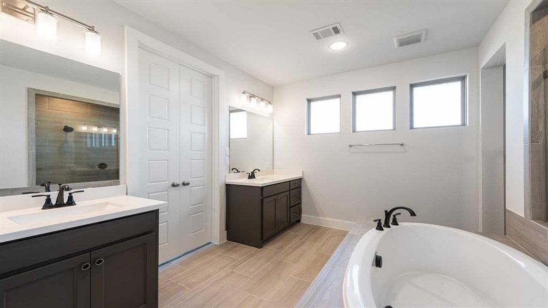 Furnished interior view inside a new home in Mosaic 50', Celina (Image 9).