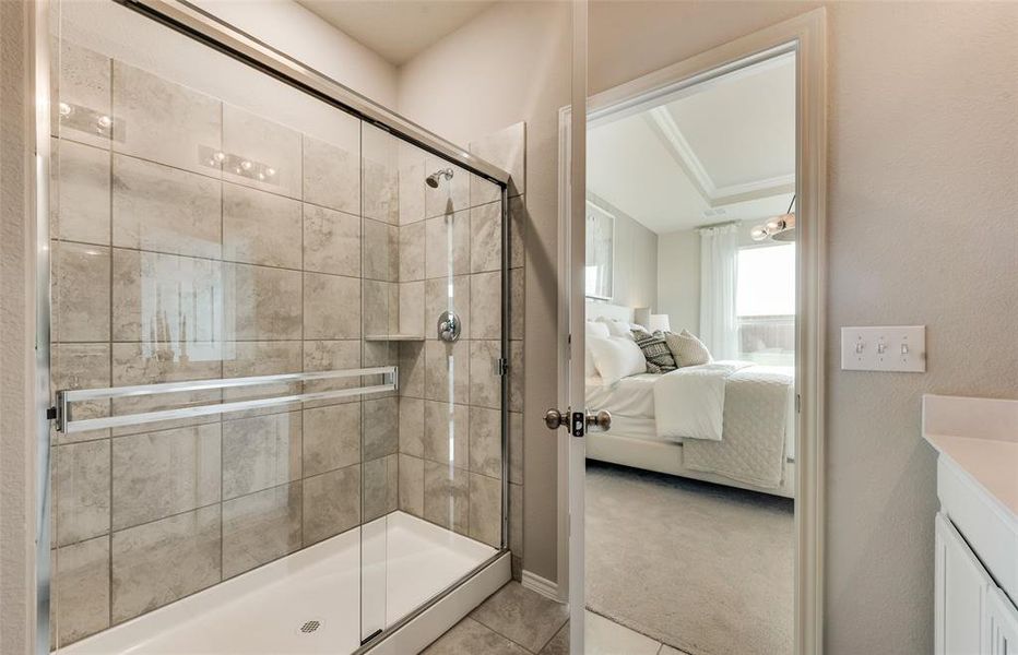 Luxurious owner's bath complete with dual sinks and oversized shower *Real Home pictured, former model.