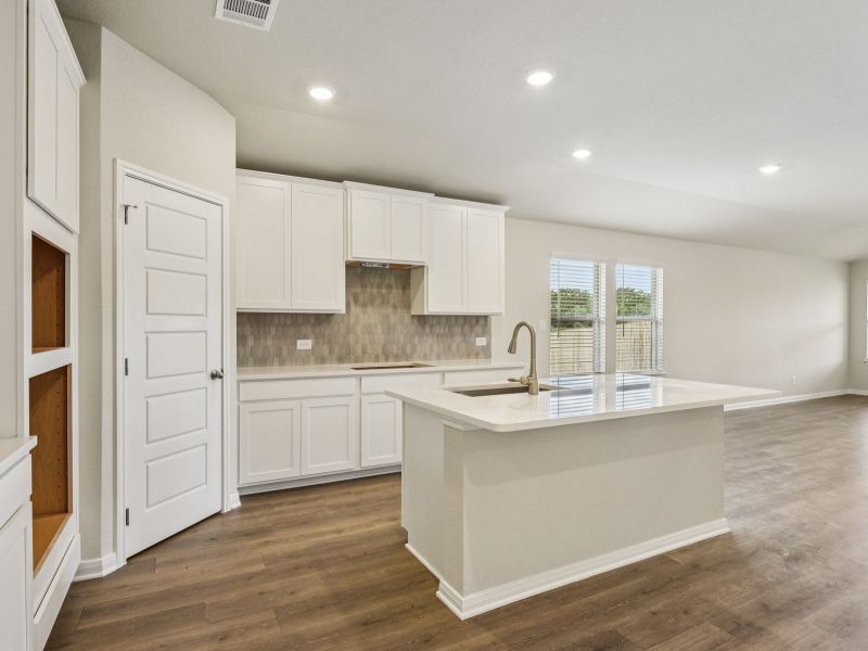 Kitchen in the Oleander floorplan at a Meritage Homes community.