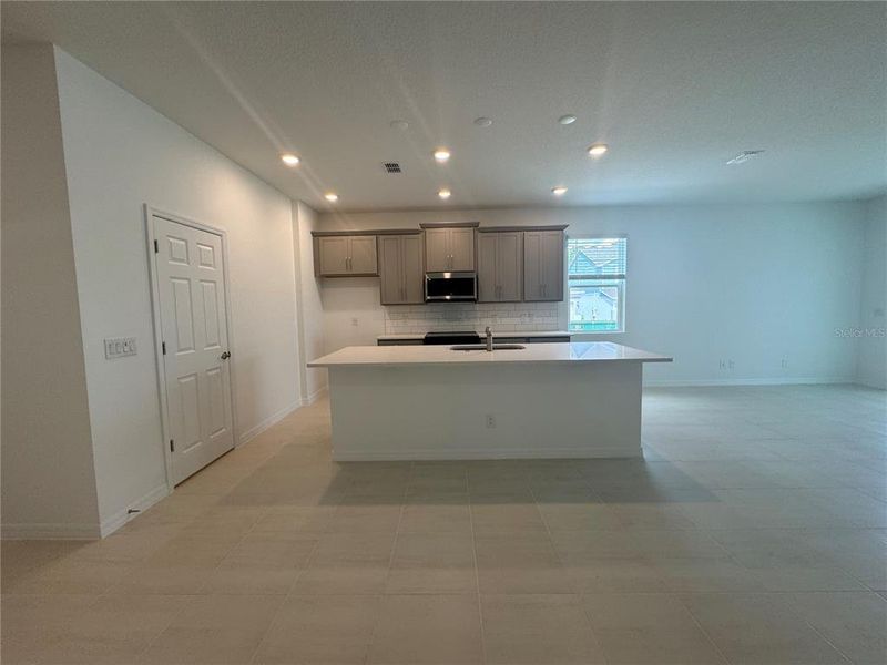 Furnished interior view inside a new home in Trinity Gardens, Deland (Image 5).
