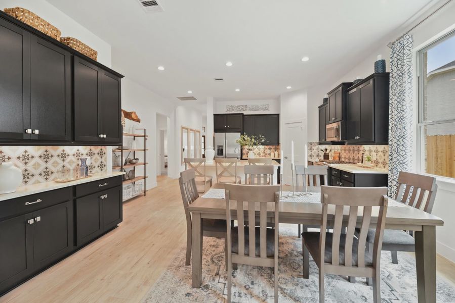 Representative furnished interior of a home built from the Athens by Chesmar Homes in Wood Leaf Reserve, Tomball (Image 6).