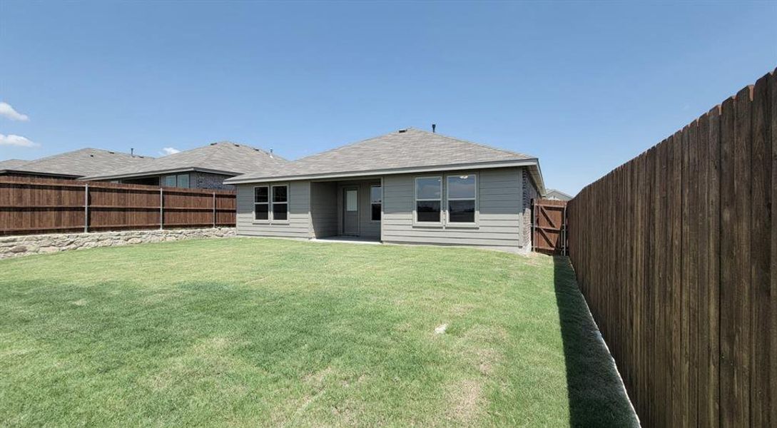 Front exterior of a new home in Highlands at Chapel Creek, Fort Worth, TX, highlighting curb appeal (Image 1). Front exterior of a new home in Highlands at Chapel Creek, Fort Worth, TX, highlighting curb appeal (Image 1).