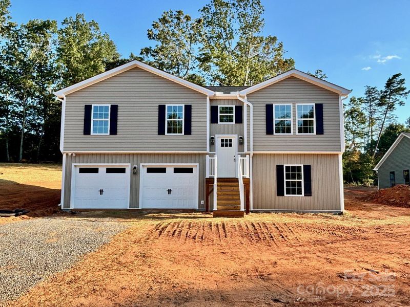 Front exterior of a new home in , Granite Falls, NC, highlighting curb appeal (Image 14). Front exterior of a new home in , Granite Falls, NC, highlighting curb appeal (Image 14).