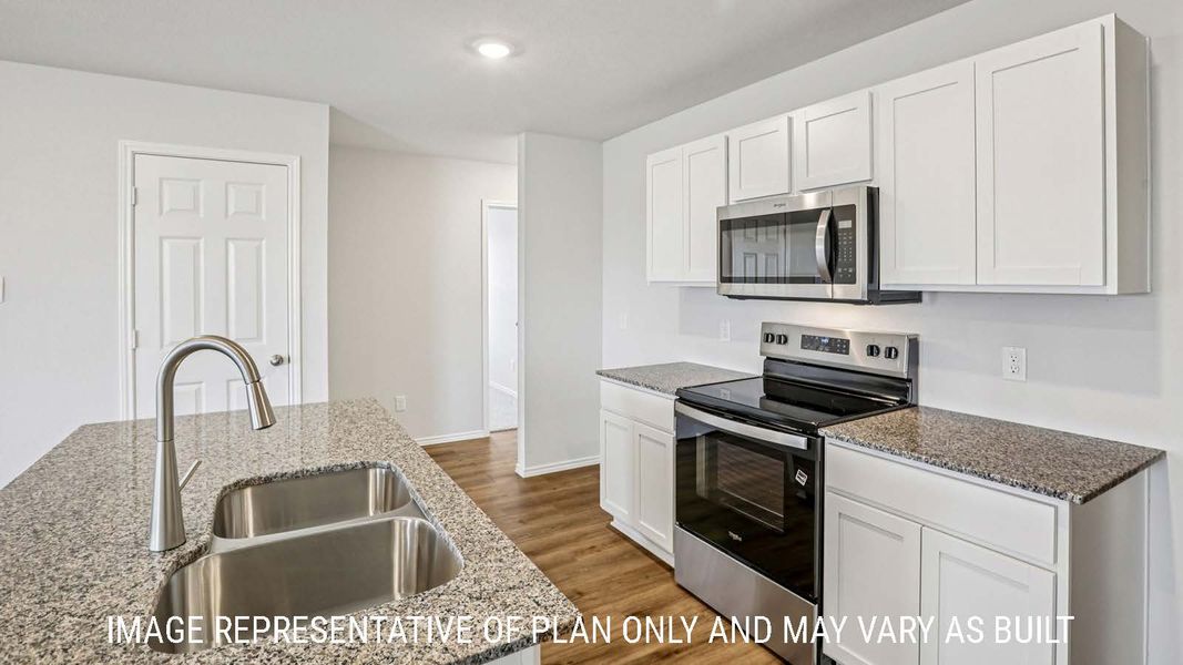Representative furnished interior of a home built from the Estero by D.R. Horton in The Villages at Schwertner Ranch, Jarrell (Image 7).