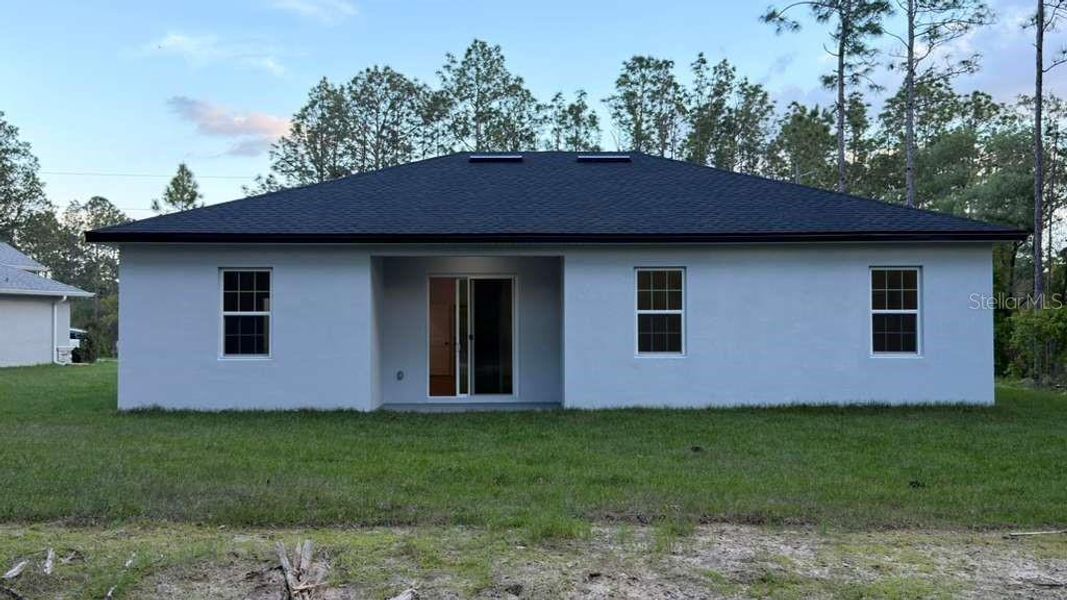 Exterior details and patio area of a home in , Citrus Springs (Image 30).