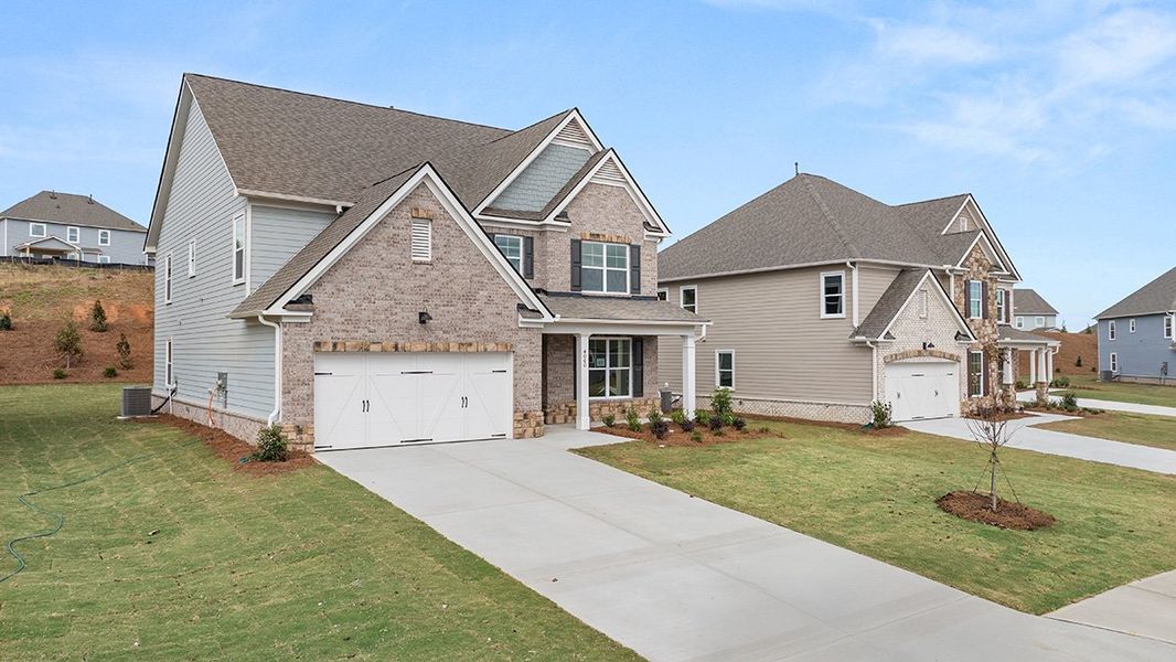 Representative exterior photo of a completed home built from the Bellview by D.R. Horton in Thalley Creek Estates, Cumming, GA (Image 21).