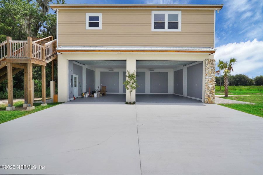 Front exterior of a new home in , East Palatka, FL, highlighting curb appeal (Image 54). Front exterior of a new home in , East Palatka, FL, highlighting curb appeal (Image 54).