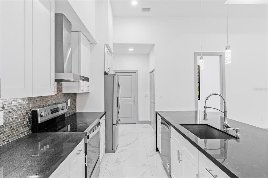 Furnished interior view inside a new home in , Port Charlotte (Image 16).