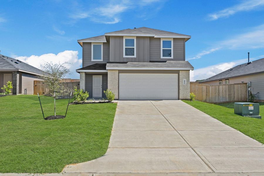 Front exterior of a new home in Mill Creek, Magnolia, TX, highlighting curb appeal (Image 4).