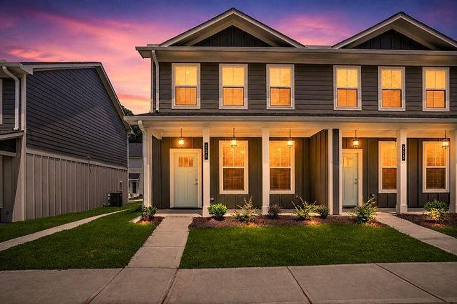 Front exterior of a new home in The Cottages at East Lanier, Fayetteville, GA, highlighting curb appeal (Image 14).