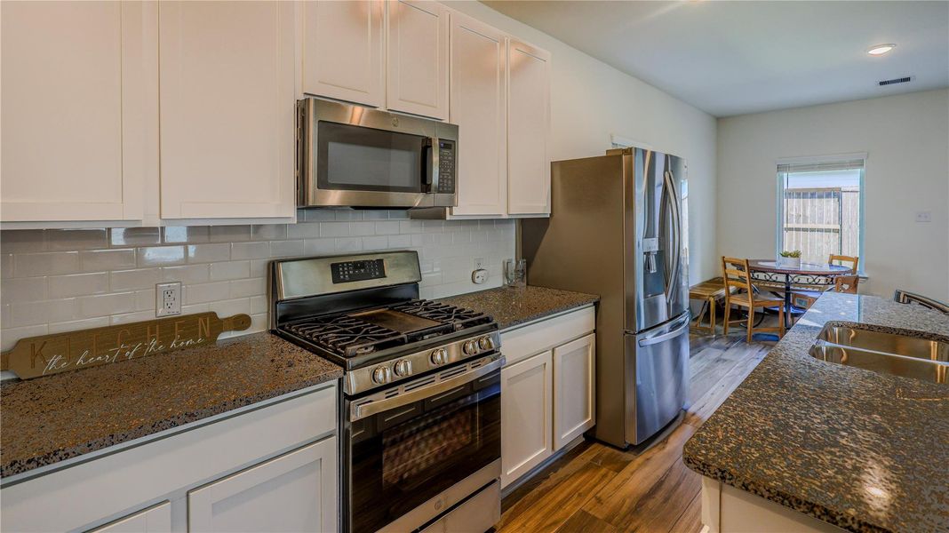 Furnished interior view inside a new home in Woodshore, Clute (Image 15).