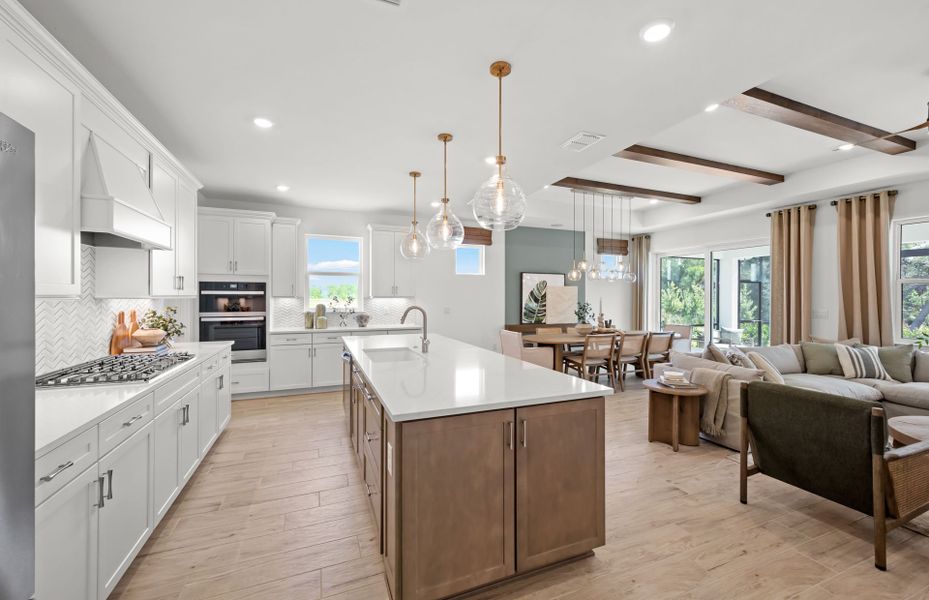 Representative furnished interior of a home built from the Palmary by DiVosta in BeachWalk by Manasota Key, Englewood (Image 5).