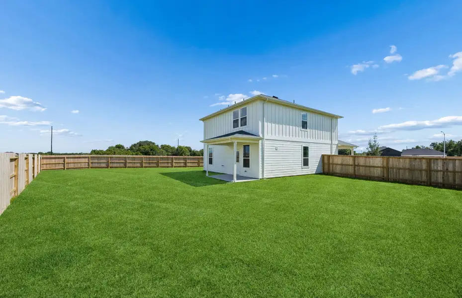 Exterior details and patio area of a home in Windcress, Cove (Image 3).