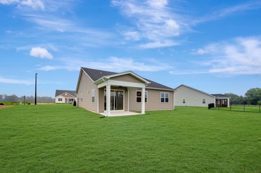 Exterior details and patio area of a home in Fox Field Farms, Broadway (Image 3).