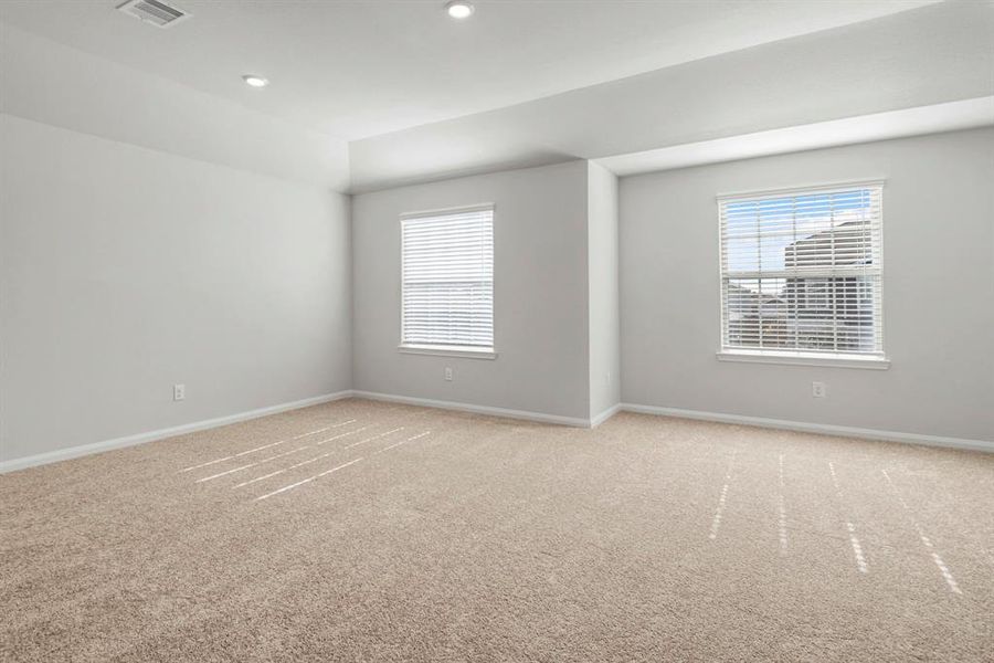 The master bedroom is huge! Look at all of this space for a bed and reading nook.