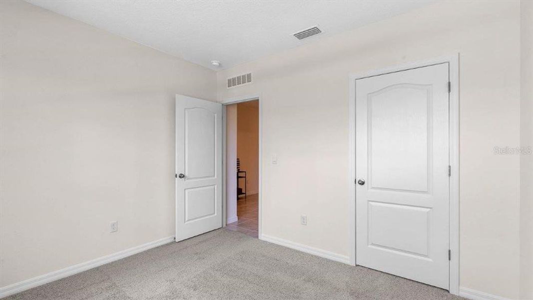 Spacious, unfurnished interior of a new home in Villamar, Winter Haven (Image 24).