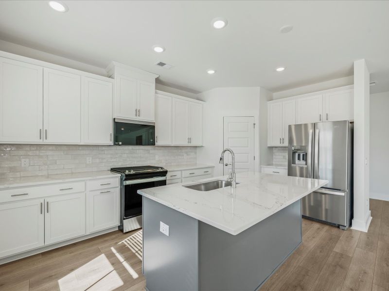 Furnished interior view inside a new home in The Coves at Lakes of Cane Bay II, Summerville (Image 5).