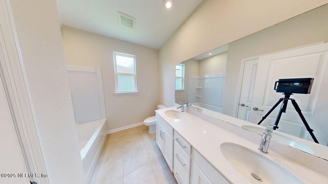 Furnished interior view inside a new home in Lakes at Bella Lago, Green Cove Springs (Image 10).