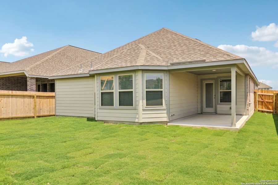 Front exterior of a new home in Kallison Ranch, San Antonio, TX, highlighting curb appeal (Image 1). Front exterior of a new home in Kallison Ranch, San Antonio, TX, highlighting curb appeal (Image 1).