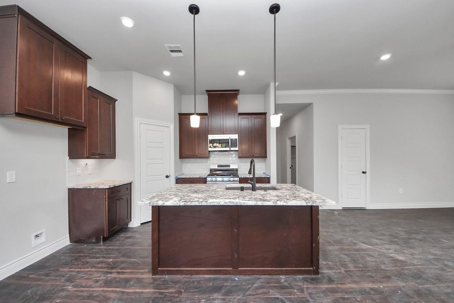 Furnished interior view inside a new home in Hill & Dale Ranch, Splendora (Image 15).
