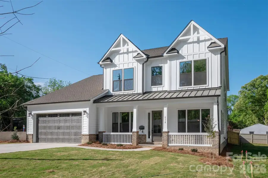 Front exterior of a new home in , Charlotte, NC, highlighting curb appeal (Image 1). Front exterior of a new home in , Charlotte, NC, highlighting curb appeal (Image 1).
