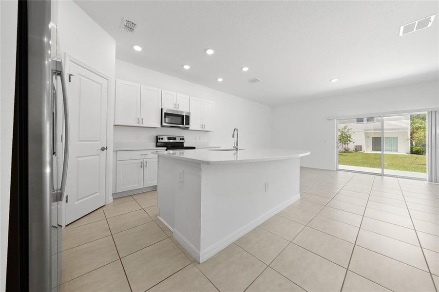 Furnished interior view inside a new home in , St. Cloud (Image 11).