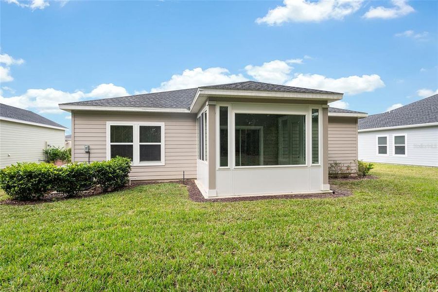 Exterior details and patio area of a home in Liberty Village: Liberty Village - Phase One, Ocala (Image 33).