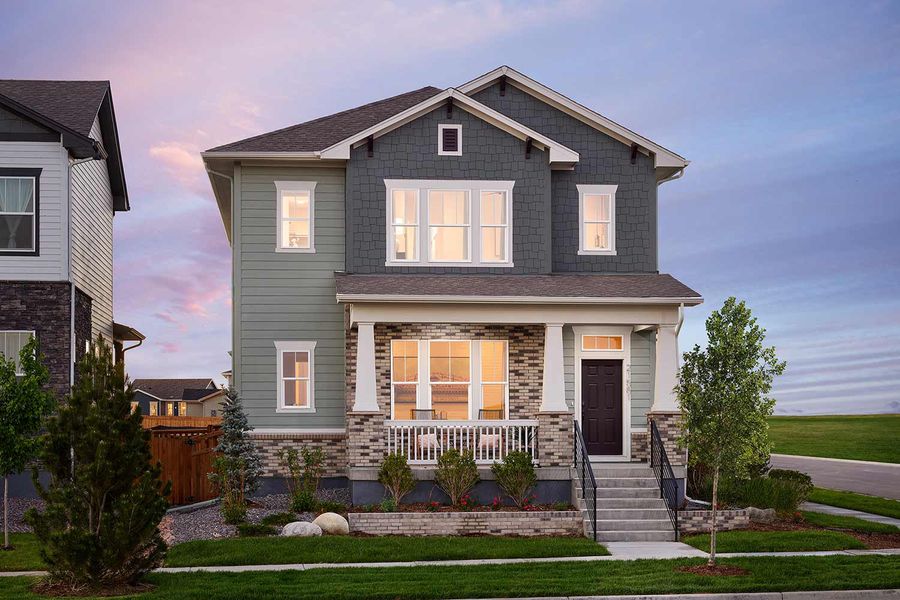 Representative exterior photo of a completed home built from the The Washburn by David Weekley Homes in Painted Prairie Cottage, Aurora, CO (Image 1).