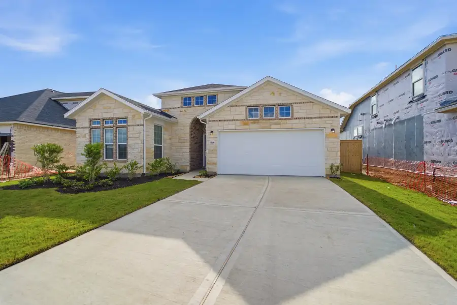 Front exterior of a new home in Ashland, Richwood, TX, highlighting curb appeal (Image 17).