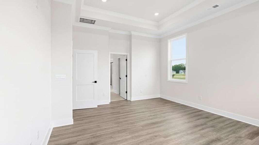 Spacious, unfurnished interior of a new home in Sycamore Cove, Woodruff (Image 35).