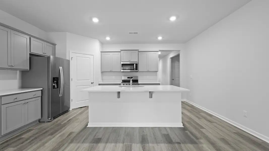 Furnished interior view inside a new home in Hillcrest, Ravenel (Image 2). Furnished interior view inside a new home in Hillcrest, Ravenel (Image 2).