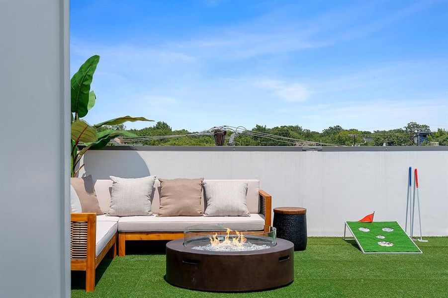 View of patio with an outdoor living space with a fire pit View of patio with an outdoor living space with a fire pit