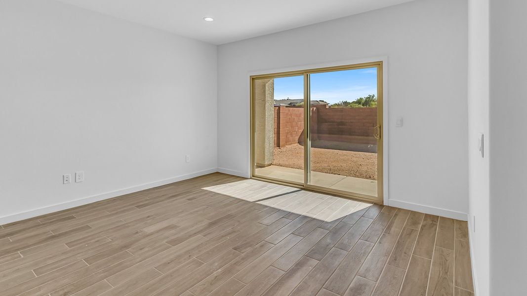 Representative unfurnished interior of a home built from the Harris by D.R. Horton in The Oasis at Rocking K, Vail (Image 32).
