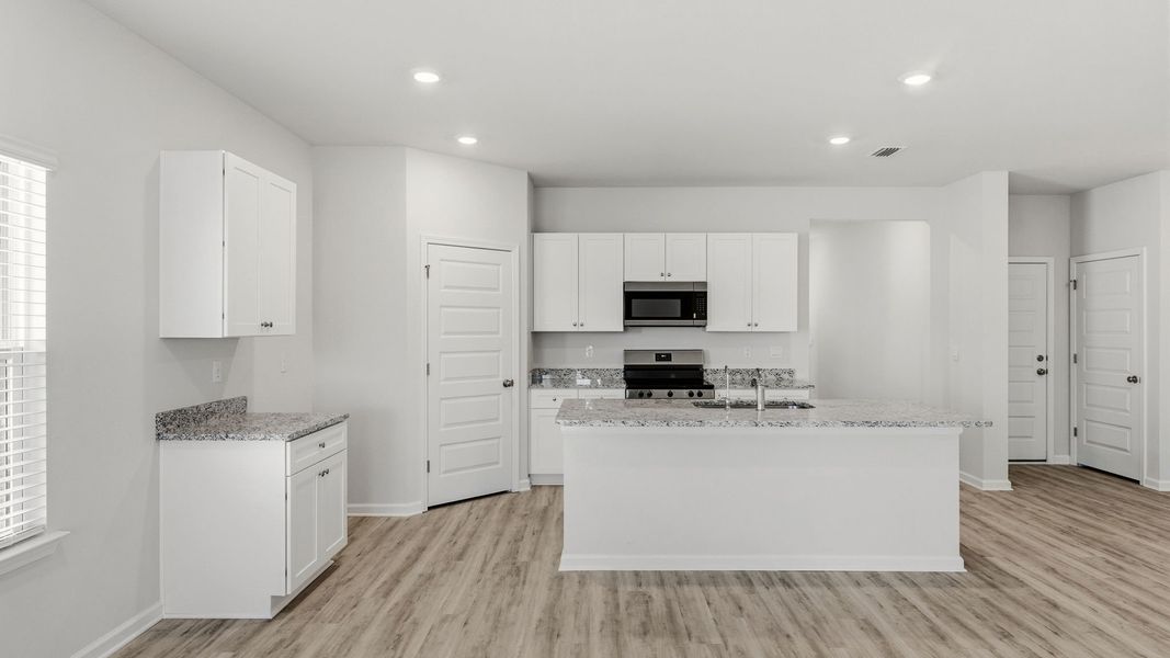 Furnished interior view inside a new home in Hodges Bayou Plantation, Panama City (Image 5).