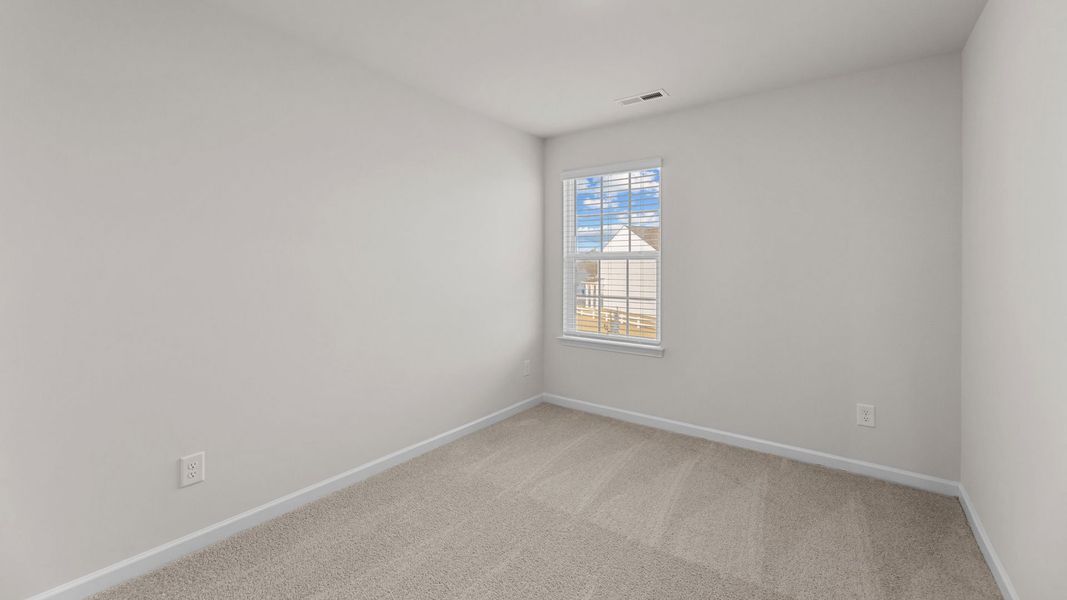 Spacious, unfurnished interior of a new home in The Townes at Ridgewood Farms, Winterville (Image 16).