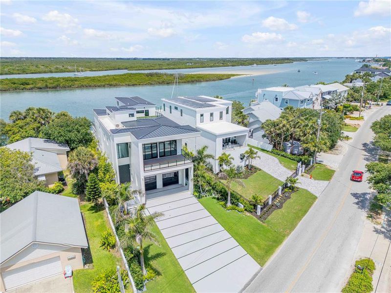 Front exterior of a new home in , New Smyrna Beach, FL, highlighting curb appeal (Image 17). Front exterior of a new home in , New Smyrna Beach, FL, highlighting curb appeal (Image 17).