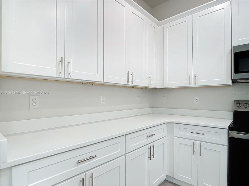 Furnished interior view inside a new home in , Port Charlotte (Image 8).