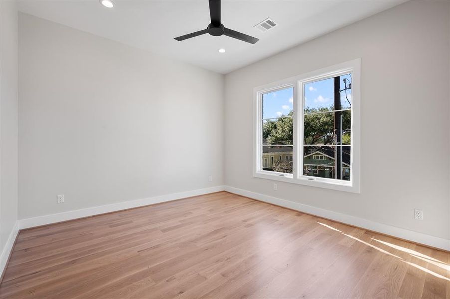 Guest bedroom with beautiful casement windows