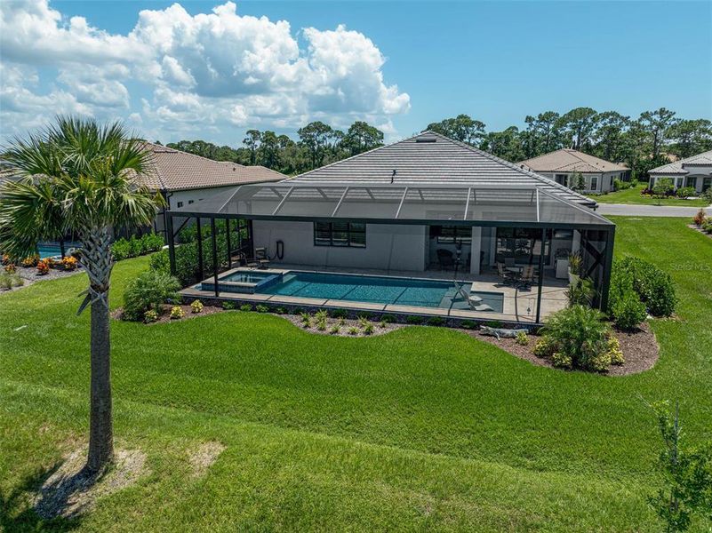Front exterior of a new home in , Nokomis, FL, highlighting curb appeal (Image 19). Front exterior of a new home in , Nokomis, FL, highlighting curb appeal (Image 19).