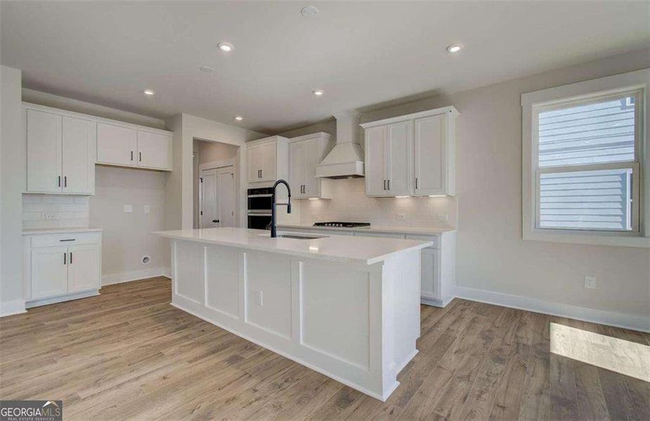Furnished interior view inside a new home in The Paddocks at Doc Hughes, Buford (Image 6).
