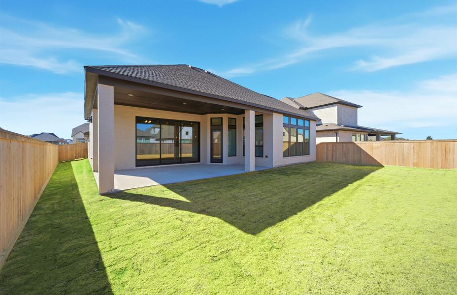 Exterior details and patio area of a home in Bridgeland 60′, Cypress (Image 23).