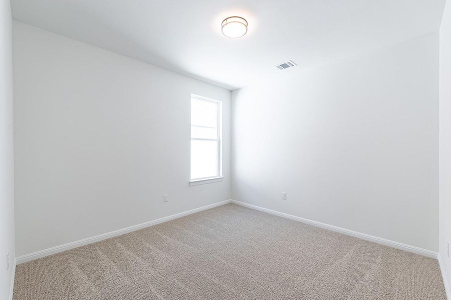 Spacious, unfurnished interior of a new home in Parmer Ranch 60, Georgetown (Image 13).