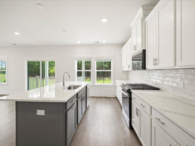 Furnished interior view inside a new home in The Coves at Lakes of Cane Bay, Summerville (Image 15).