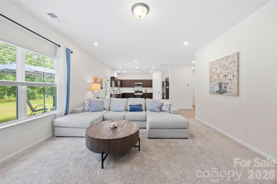 Furnished interior view inside a new home in Orchard Creek, Charlotte (Image 31).