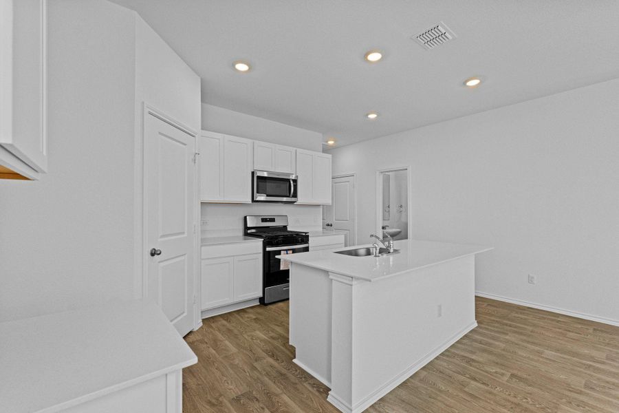 Furnished interior view inside a new home in Valverde, Bastrop (Image 13).