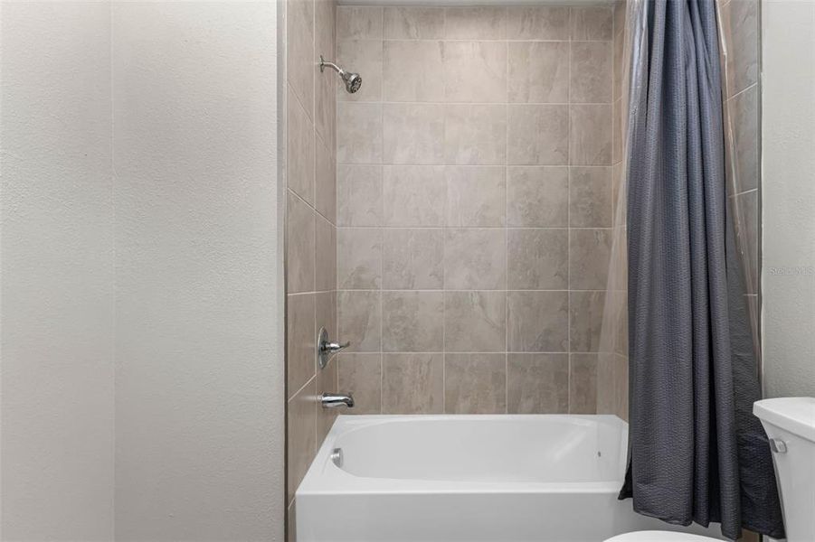 Furnished interior view inside a new home in , Port Charlotte (Image 11). Furnished interior view inside a new home in , Port Charlotte (Image 11).