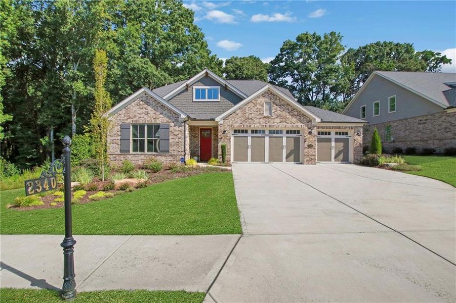 Front exterior of a new home in , Cumming, GA, highlighting curb appeal (Image 21). Front exterior of a new home in , Cumming, GA, highlighting curb appeal (Image 21).