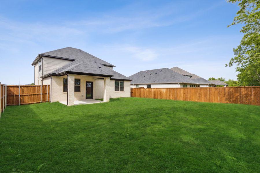 Covered Patio in the Pearl home plan by Trophy Signature Homes – REPRESENTATIVE PHOTO