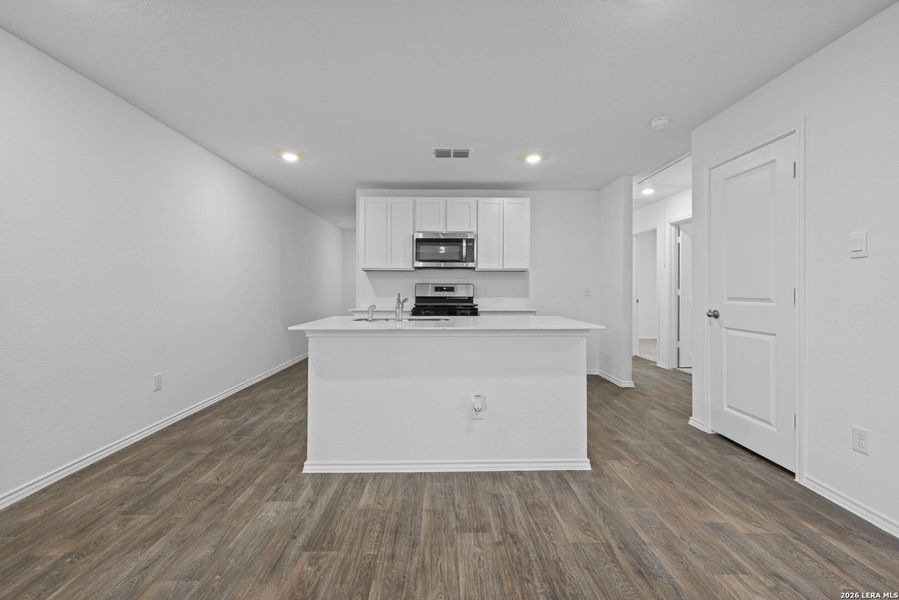 Furnished interior view inside a new home in Avenida, Converse (Image 9).